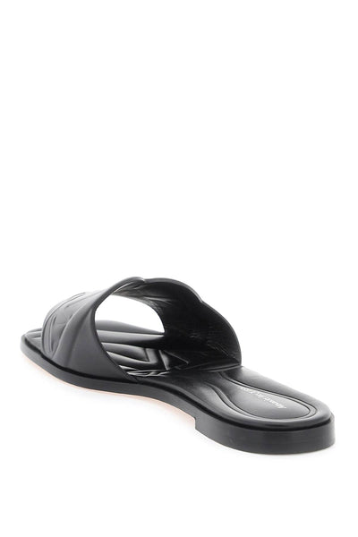 Alexander mcqueen leather slides with embossed seal logo 780714 WIEAD BLACK