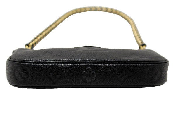 LOUIS VUITTON Louis Vuitton Black Monogram Empreinte Leather Pochette | Italystation.com - Shop Now at italystation.com