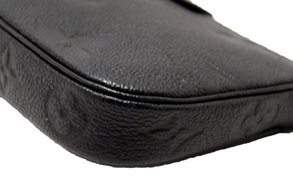 LOUIS VUITTON Louis Vuitton Black Monogram Empreinte Leather Pochette | Italystation.com - Shop Now at italystation.com