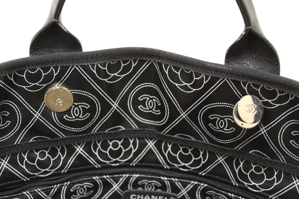 CHANEL Chanel Black and Beige Coated Canvas Camellia Flower Tote Bag | Italystation.com - Shop Now at italystation.com