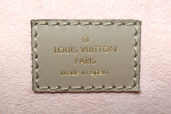Louis Vuitton Turtledove Monogram Empreinte Leather Montsouris MM Backpack