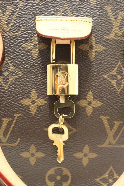 Louis Vuitton Classic Monogram Rivoli PM Hand/Crossbody Bag