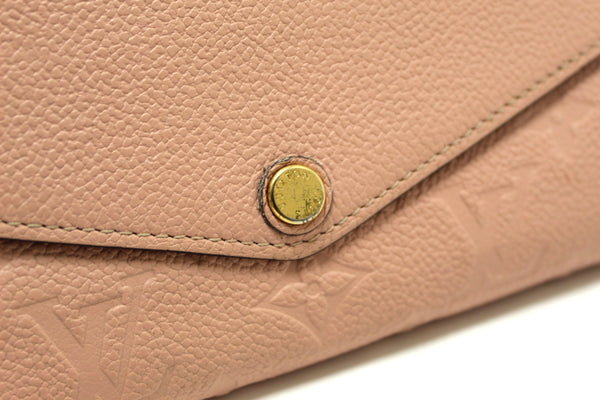 Louis Vuitton Pink Monogram Empreinte Leather Sarah Wallet