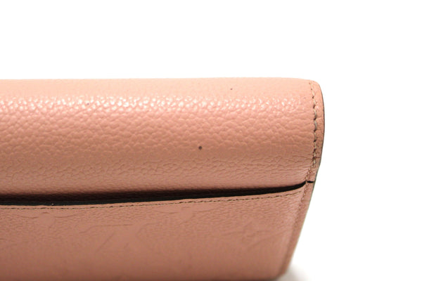 Louis Vuitton Pink Monogram Empreinte Leather Sarah Wallet