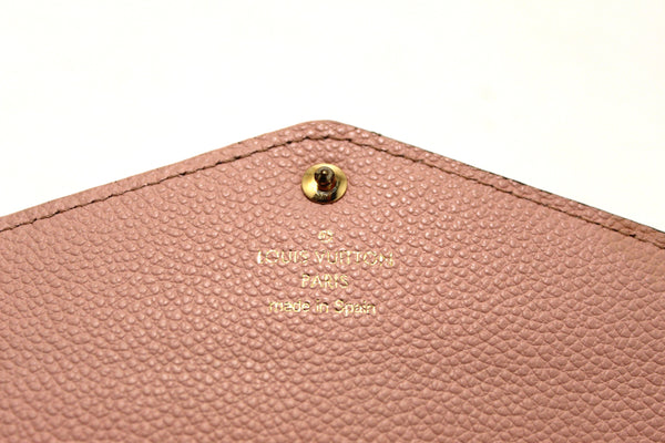 Louis Vuitton Pink Monogram Empreinte Leather Sarah Wallet
