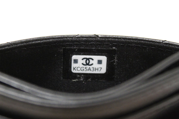 chanel black calfskin quilted reissue card holder | Shop Now at Italystation.com