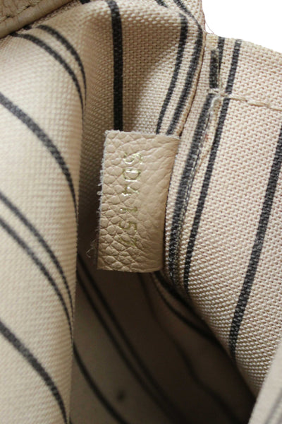 Louis Vuitton Beige Monogram Empreinte Leather Montaigne MM Bag