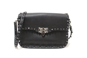 Valentino Garavani Black Grained Calfskin Rolling Rockstud Flap Crossbody Bag