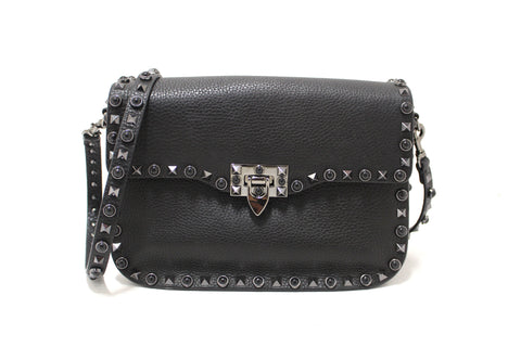 Valentino Garavani Black Grained Calfskin Rolling Rockstud Flap Crossbody Bag