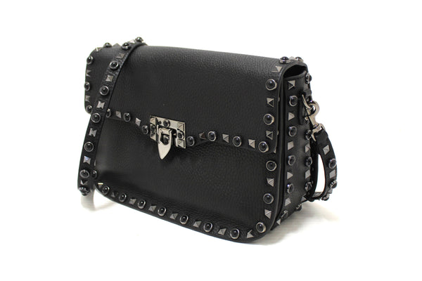 Valentino Garavani Black Grained Calfskin Rolling Rockstud Flap Crossbody Bag