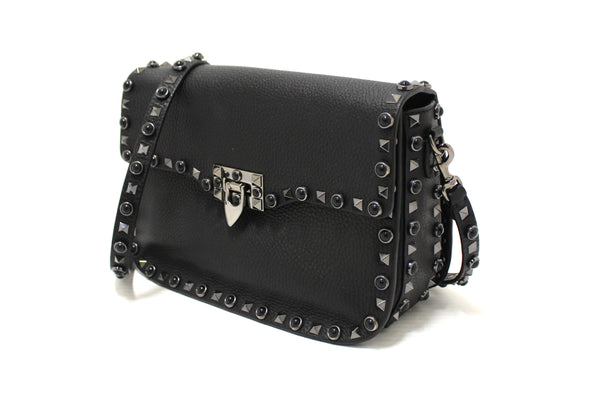 Valentino Garavani Black Grained Calfskin Rolling Rockstud Flap Crossbody Bag
