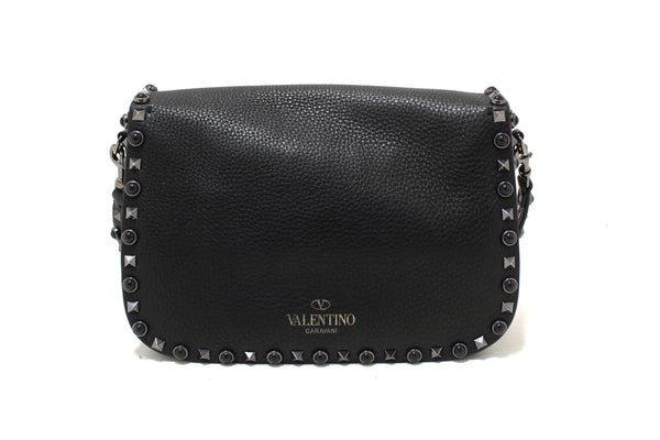 Valentino Garavani Black Grained Calfskin Rolling Rockstud Flap Crossbody Bag