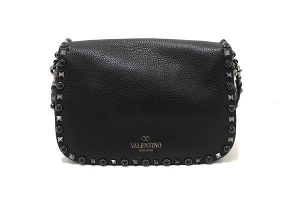 Valentino Garavani Black Grained Calfskin Rolling Rockstud Flap Crossbody Bag