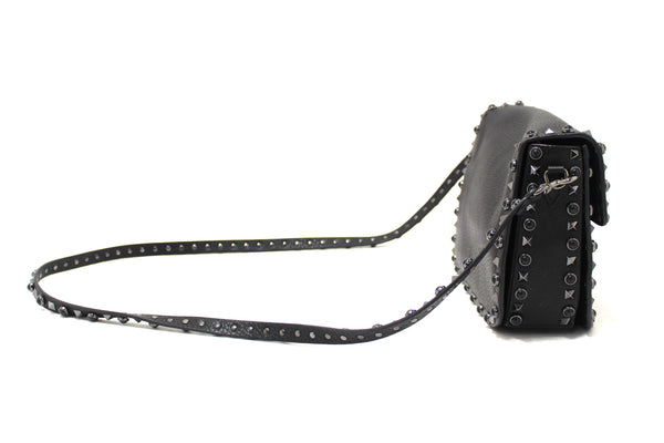 Valentino Garavani Black Grained Calfskin Rolling Rockstud Flap Crossbody Bag