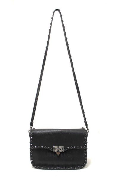 Valentino Garavani Black Grained Calfskin Rolling Rockstud Flap Crossbody Bag