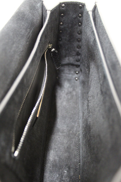 Valentino Garavani Black Grained Calfskin Rolling Rockstud Flap Crossbody Bag
