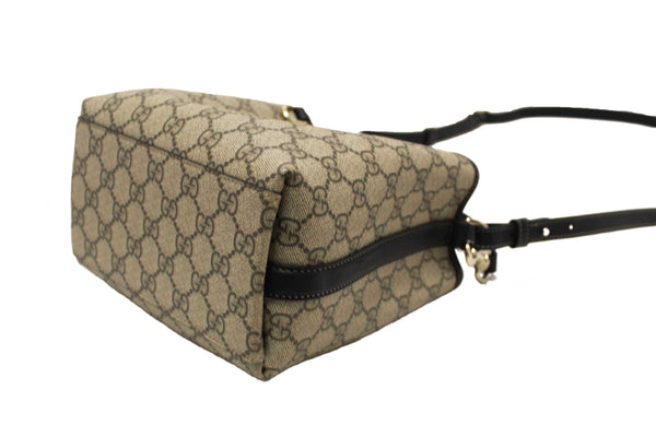 Gucci GG Supreme Monogram with Black Leather Emblem Mini Bucket Bag 815118