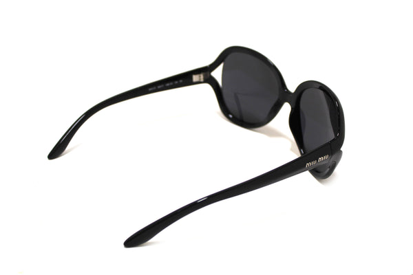 Miu Miu Black Oversized Sunglasses SMU171 | Italystation.com - Shop Now at italystation.com