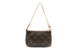 Louis Vuitton Classic Monogram Canvas Mini Pochette Clut | Italystation.com - Shop Now at italystation.com