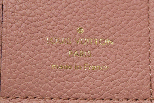 Louis Vuitton Pink Monogram Empreinte Leather Zoe Wallet