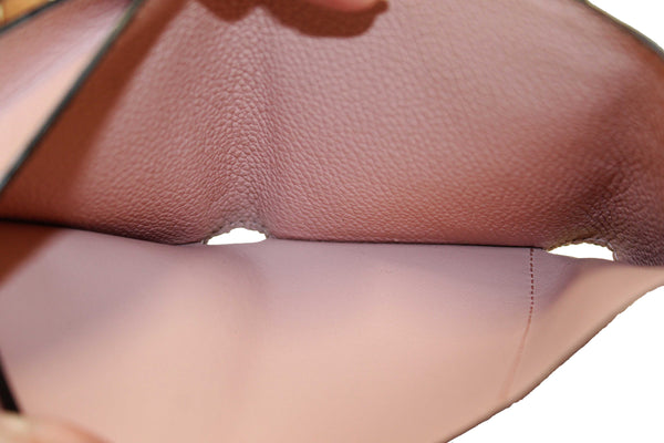 Louis Vuitton Pink Monogram Empreinte Leather Zoe Wallet