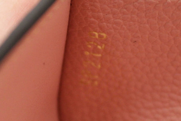 Louis Vuitton Pink Monogram Empreinte Leather Zoe Wallet