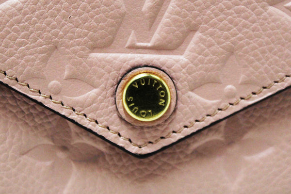 Louis Vuitton Pink Monogram Empreinte Leather Zoe Wallet