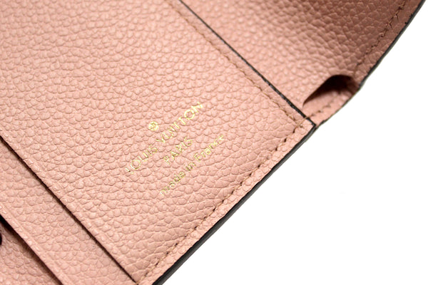 Louis Vuitton Pink Monogram Empreinte Leather Zoé Wallet