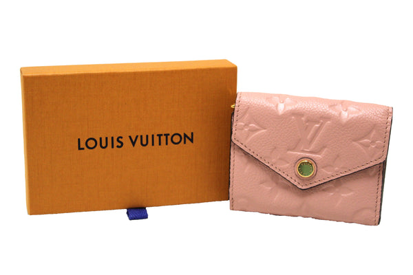 Authentic Louis Vuitton Pink Monogram Empreinte Leather Zoe Wallet