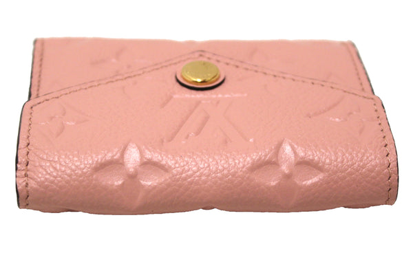 Authentic Louis Vuitton Pink Monogram Empreinte Leather Zoe Wallet