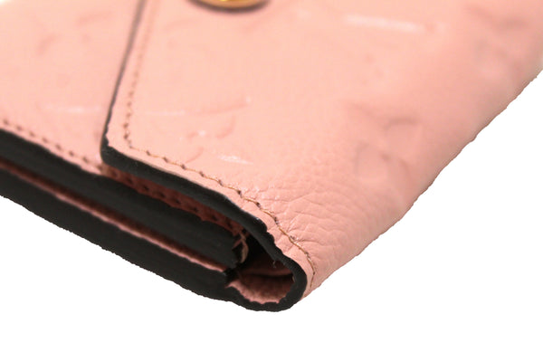 Authentic Louis Vuitton Pink Monogram Empreinte Leather Zoe Wallet