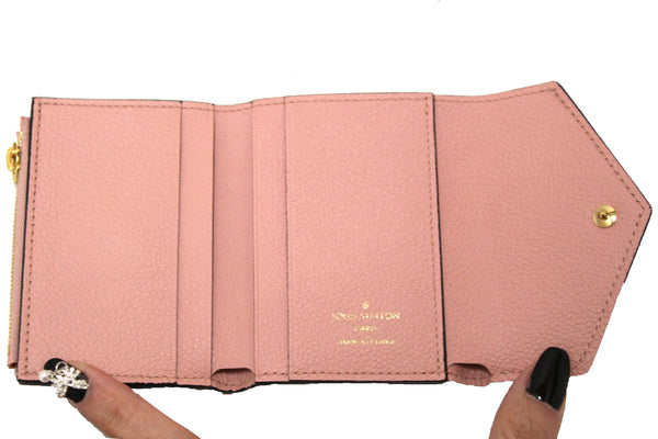 Authentic Louis Vuitton Pink Monogram Empreinte Leather Zoe Wallet