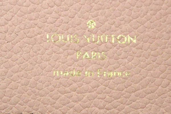 Authentic Louis Vuitton Pink Monogram Empreinte Leather Zoe Wallet