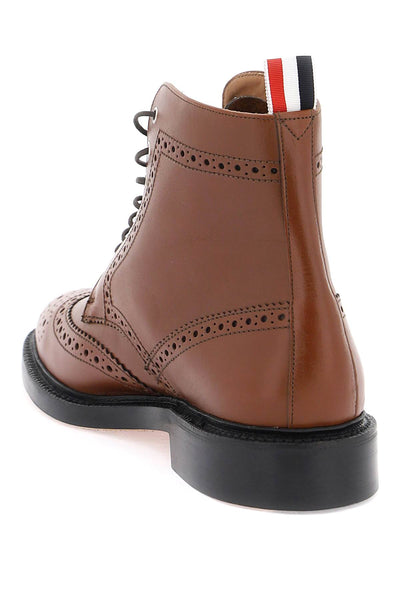 wingtip ankle boots with brogue details MFB204AL0063 MED BROWN