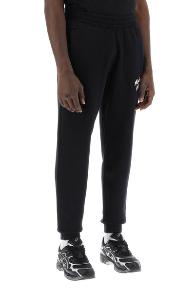"sporty pants with handwriting MM01104KM0307 BLACK WHITE