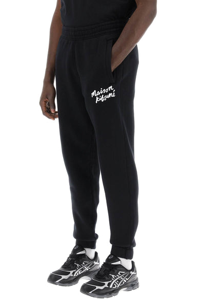 "sporty pants with handwriting MM01104KM0307 BLACK WHITE