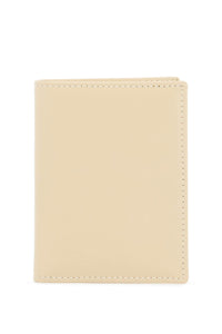 COMME DES GARCONS WALLET small bi-fold wallet | Italystation.com - Shop Now at italystation.com
