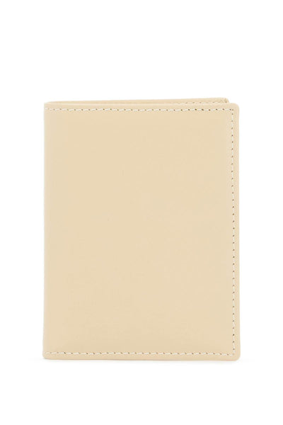 COMME DES GARCONS WALLET small bi-fold wallet | Italystation.com - Shop Now at italystation.com