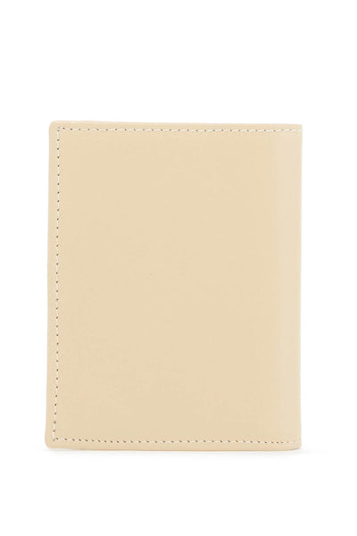 COMME DES GARCONS WALLET small bi-fold wallet | Italystation.com - Shop Now at italystation.com
