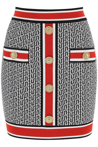 Balmain mini skirt in monogram knit BF1LB292KE89 NOIR BLANC ROUGE