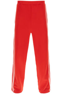 Ami paris track pants with side bands HTR218 JE0005 SCARLET RED