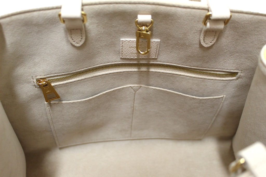 Louis Vuitton Onthego MM Rose Beige in Cowhide Leather with Gold-tone - US