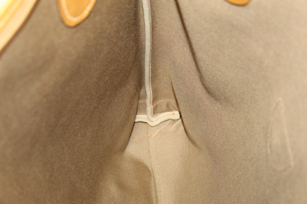 Gucci復古棕色GG畫布，帶有網狀條紋手提袋