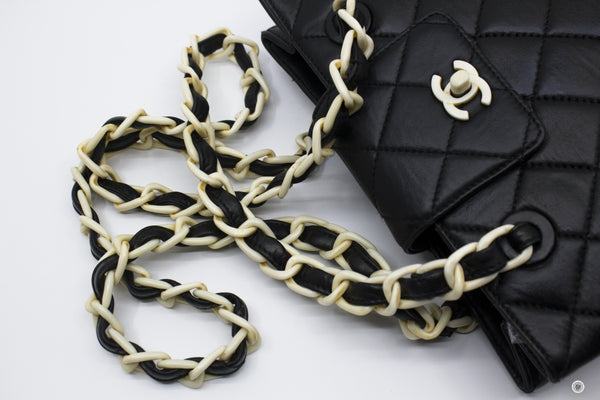 chanel-vintage-with-resin-woven-chain-and-lock-lambskin-tote-bag-IS036567