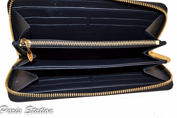 Limited Edition Louis Vuitton Teal & Beige Vernis Leopard Zippy Wallet